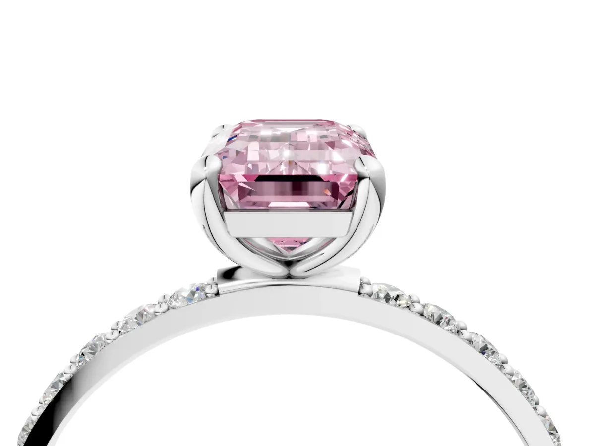 Fancy Pink Emerald Cut Diamond Solitaire Ring with Round Pavé Band and Prong Setting Platinum