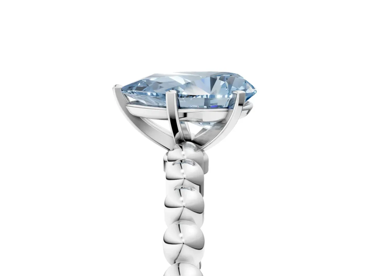 Fancy Blue Pear Cut Diamond Solitaire Ring with Beaded Band and Prong Setting Silver