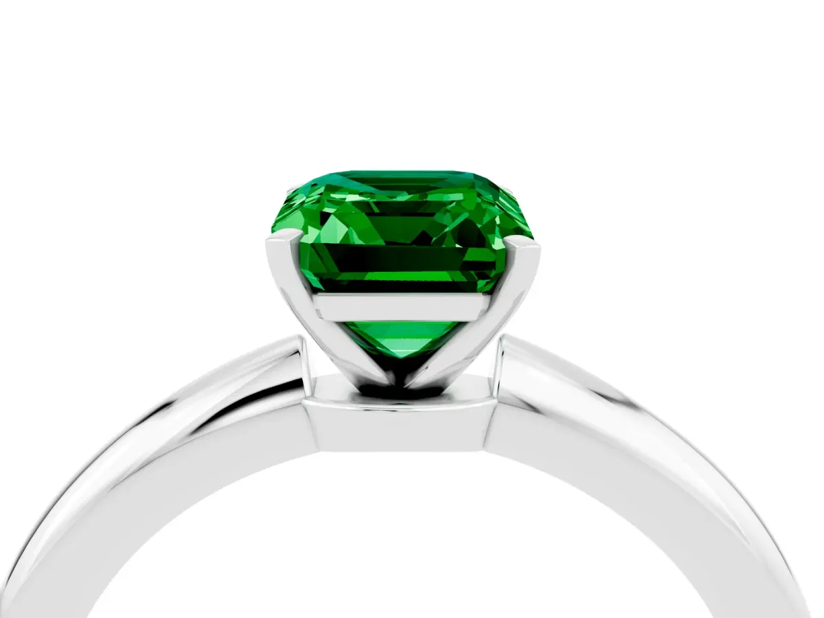 Emerald Cut Emerald Solitaire Ring with Six-Prong Setting and Classic Band Silver