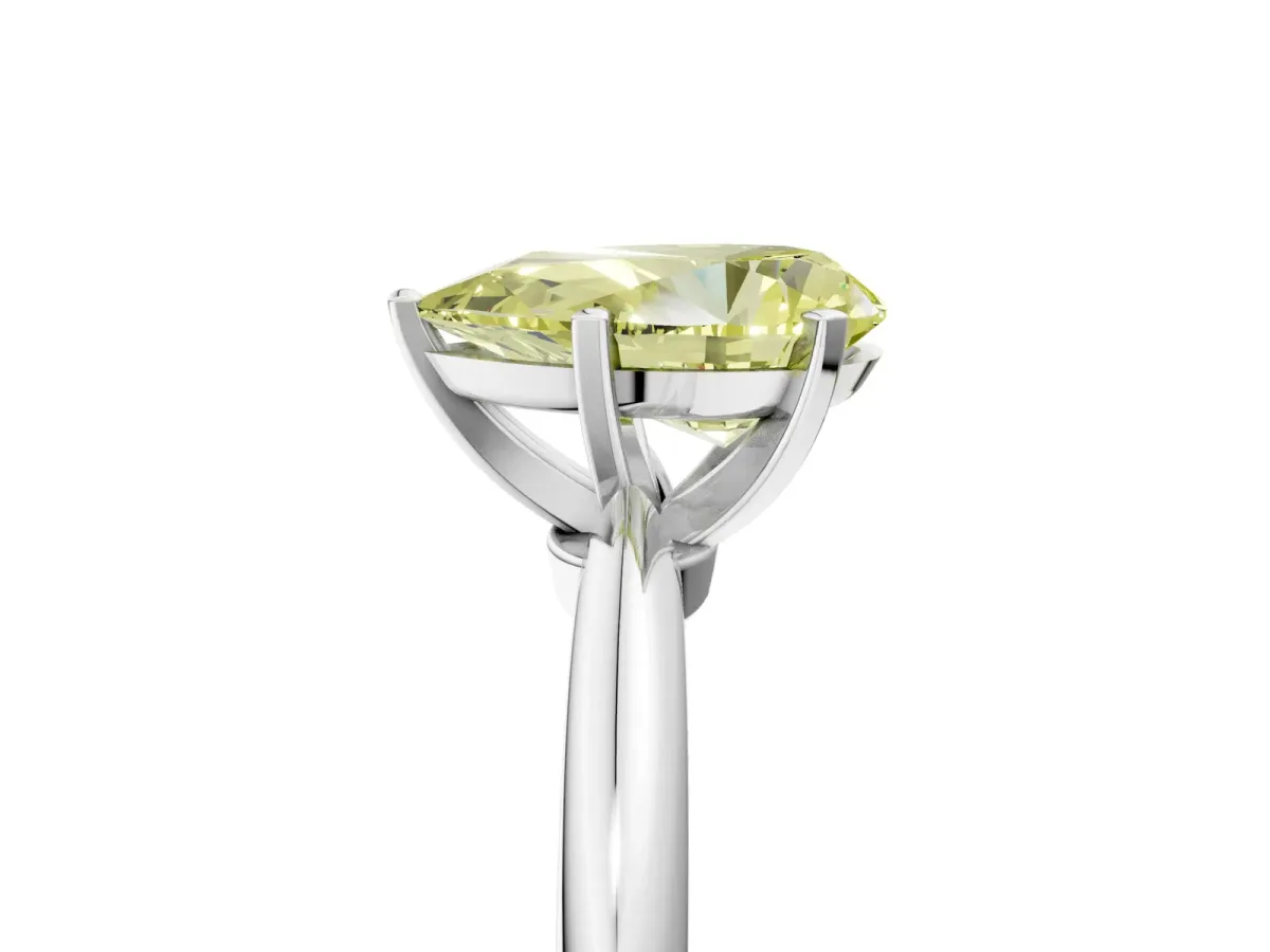 Fancy Yellow Pear Cut Diamond Solitaire Ring with Six-Prong Setting and Classic Band Silver