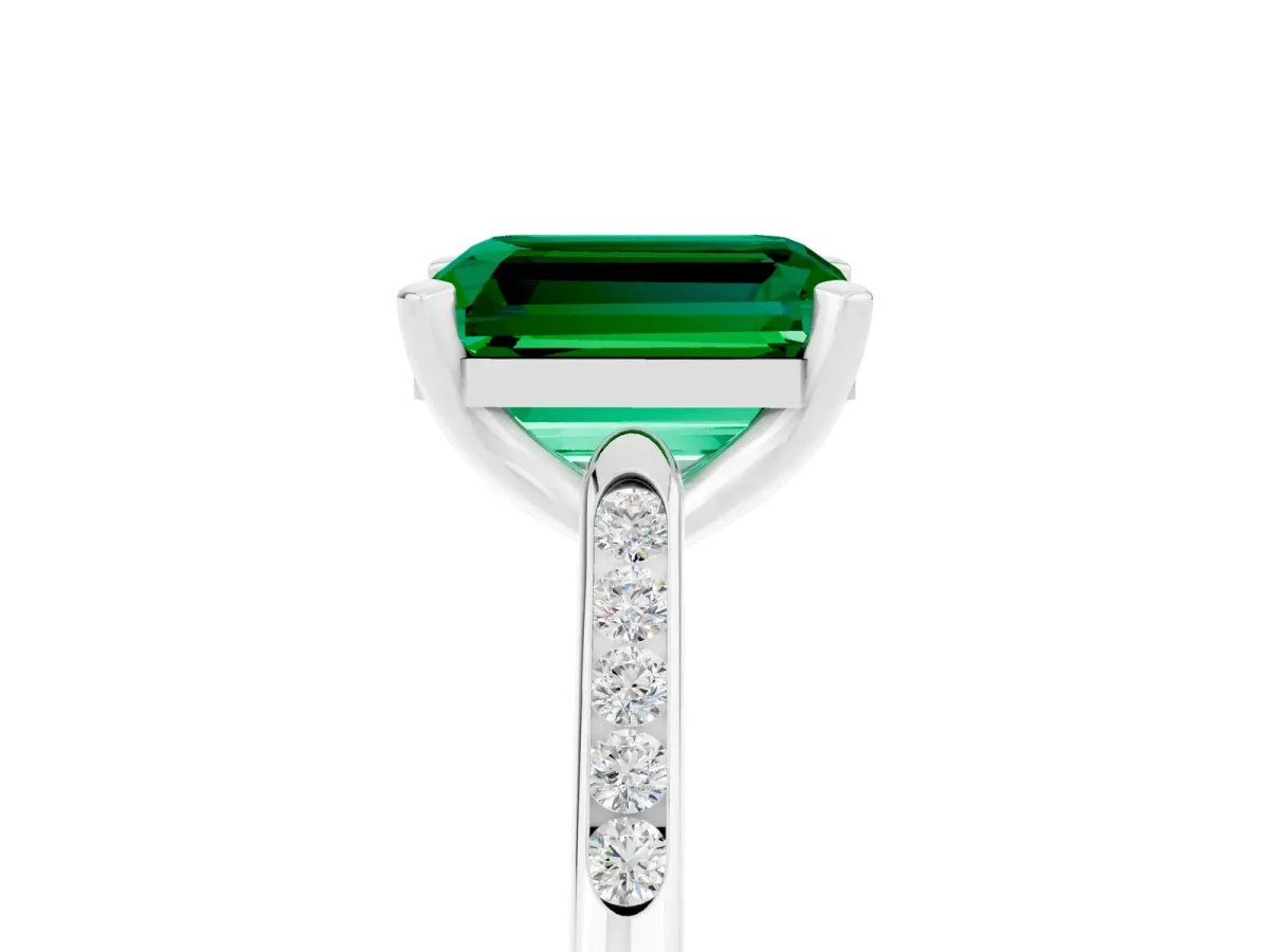 Emerald Cut Emerald Solitaire Ring with Channel Set Round Band and Prong Setting White gold