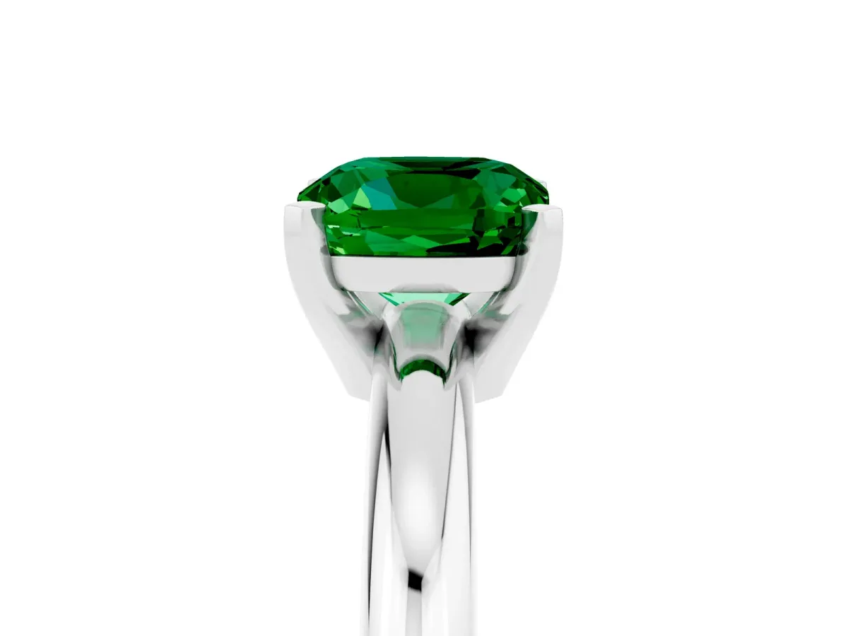 Cushion Cut Emerald Solitaire Engagement Ring with Round Band and Four-Prong Setting Silver
