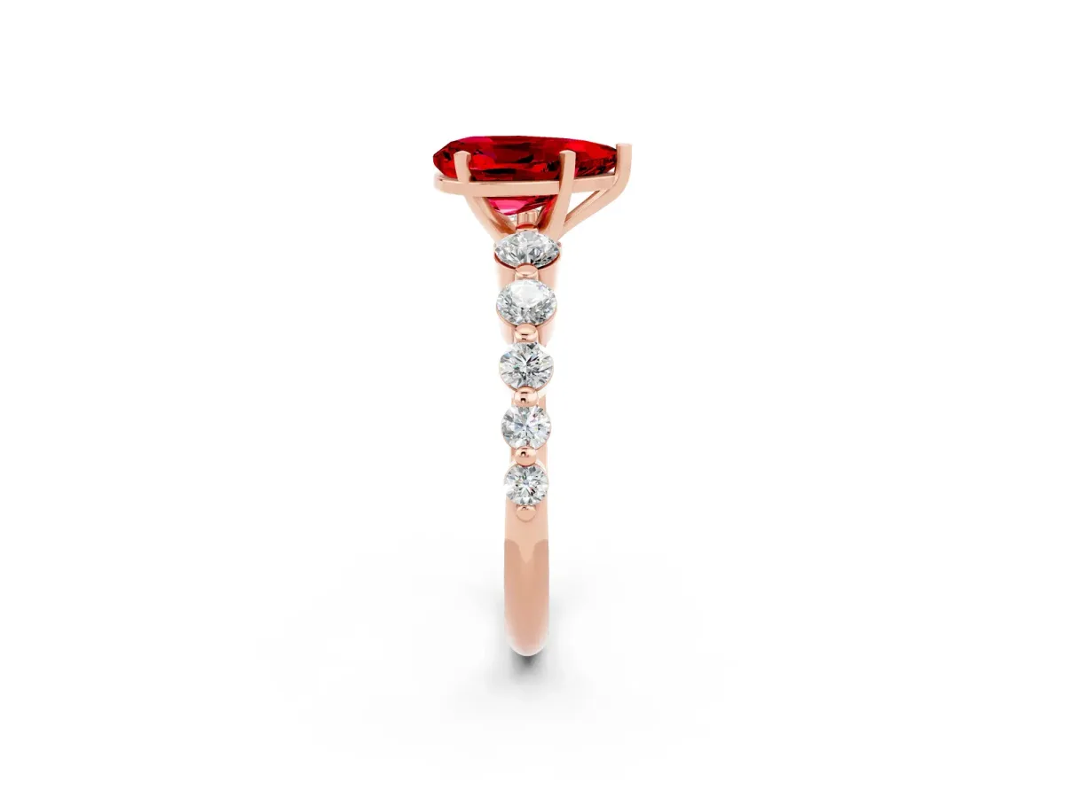 Pear Cut Solitaire Ruby Ring with Pave Band and Four-Prong Setting Rose gold