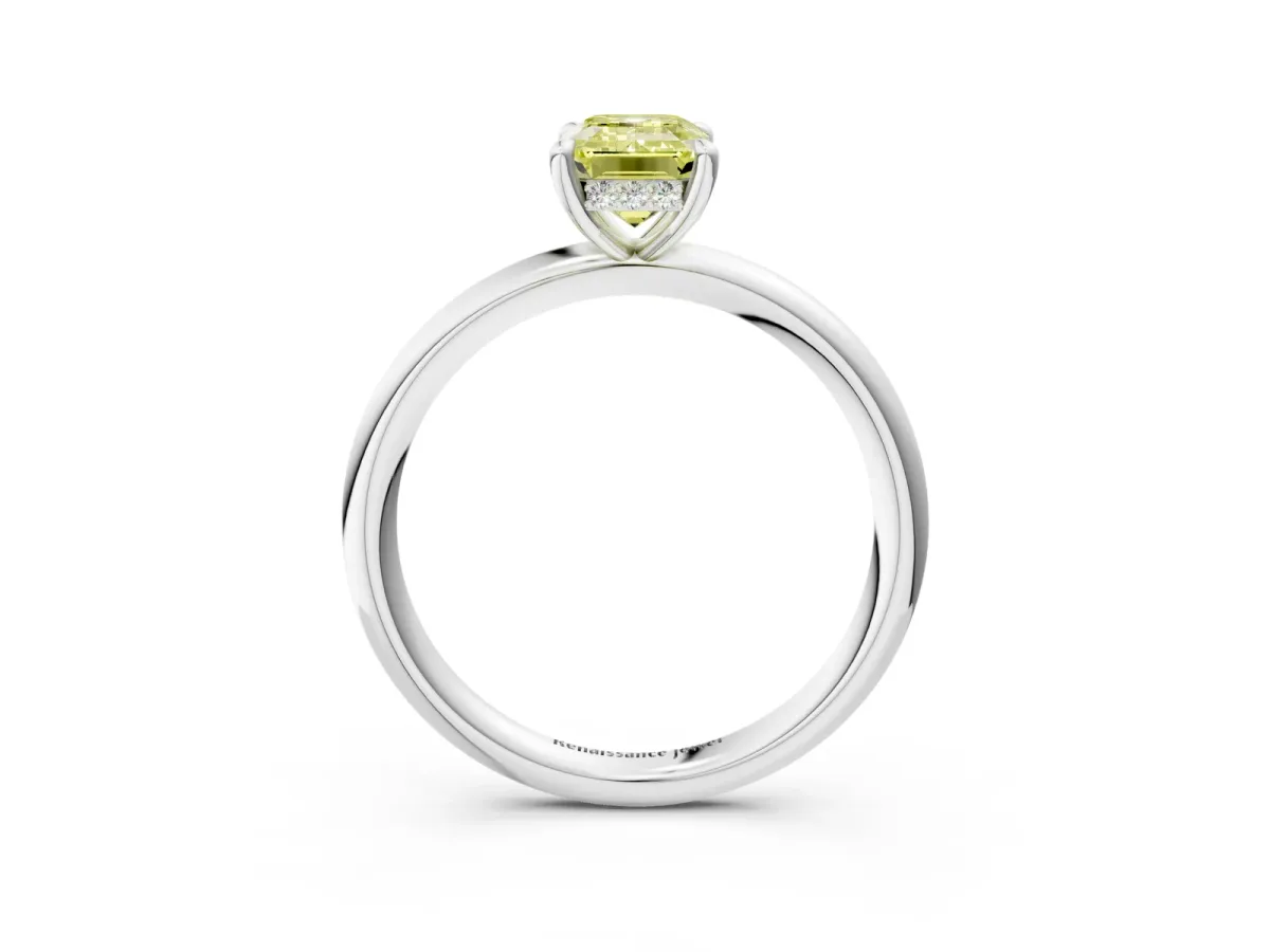Fancy Yellow Emerald Cut Diamond Solitaire Ring with Thin Band and Four-Prong Setting Platinum