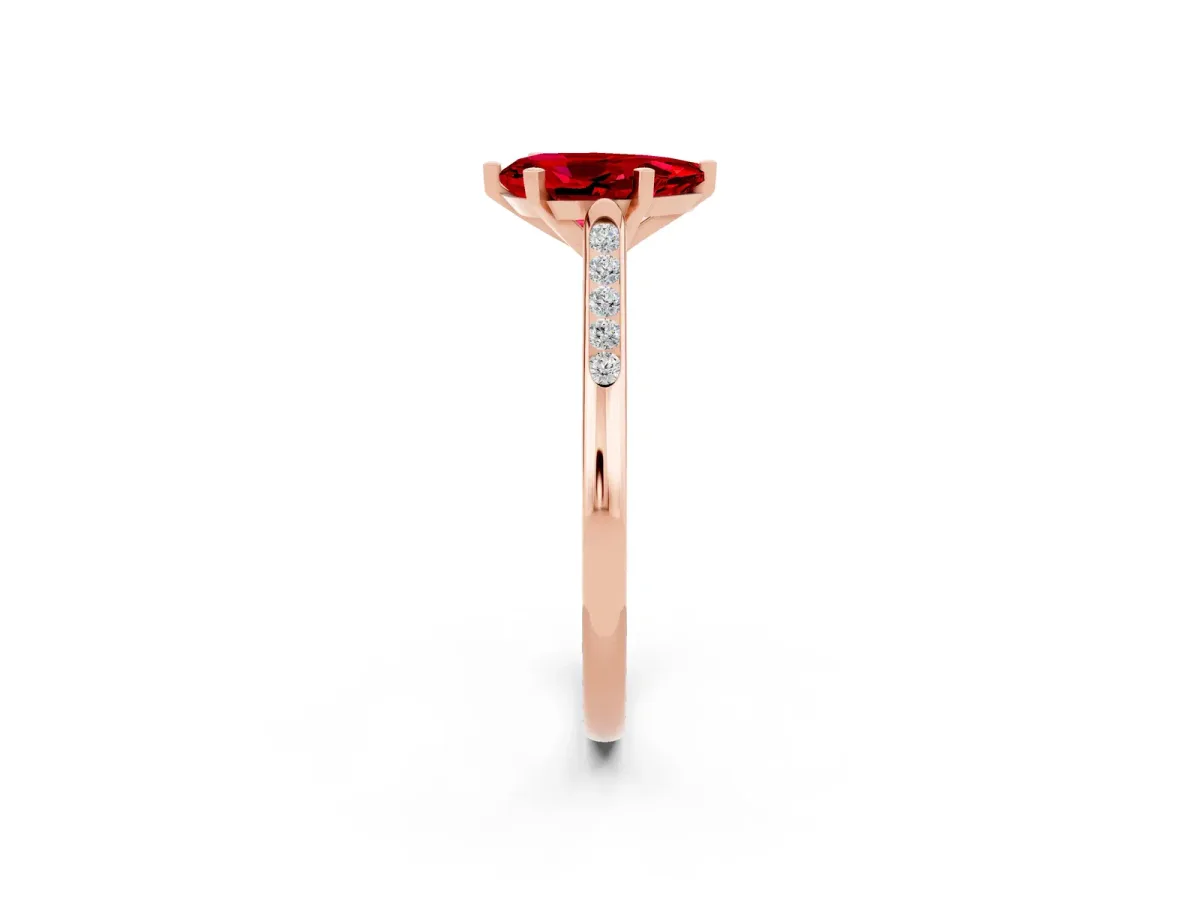 Pear Cut Ruby Solitaire Ring with Channel Set Round Band and Prong Setting Rose gold
