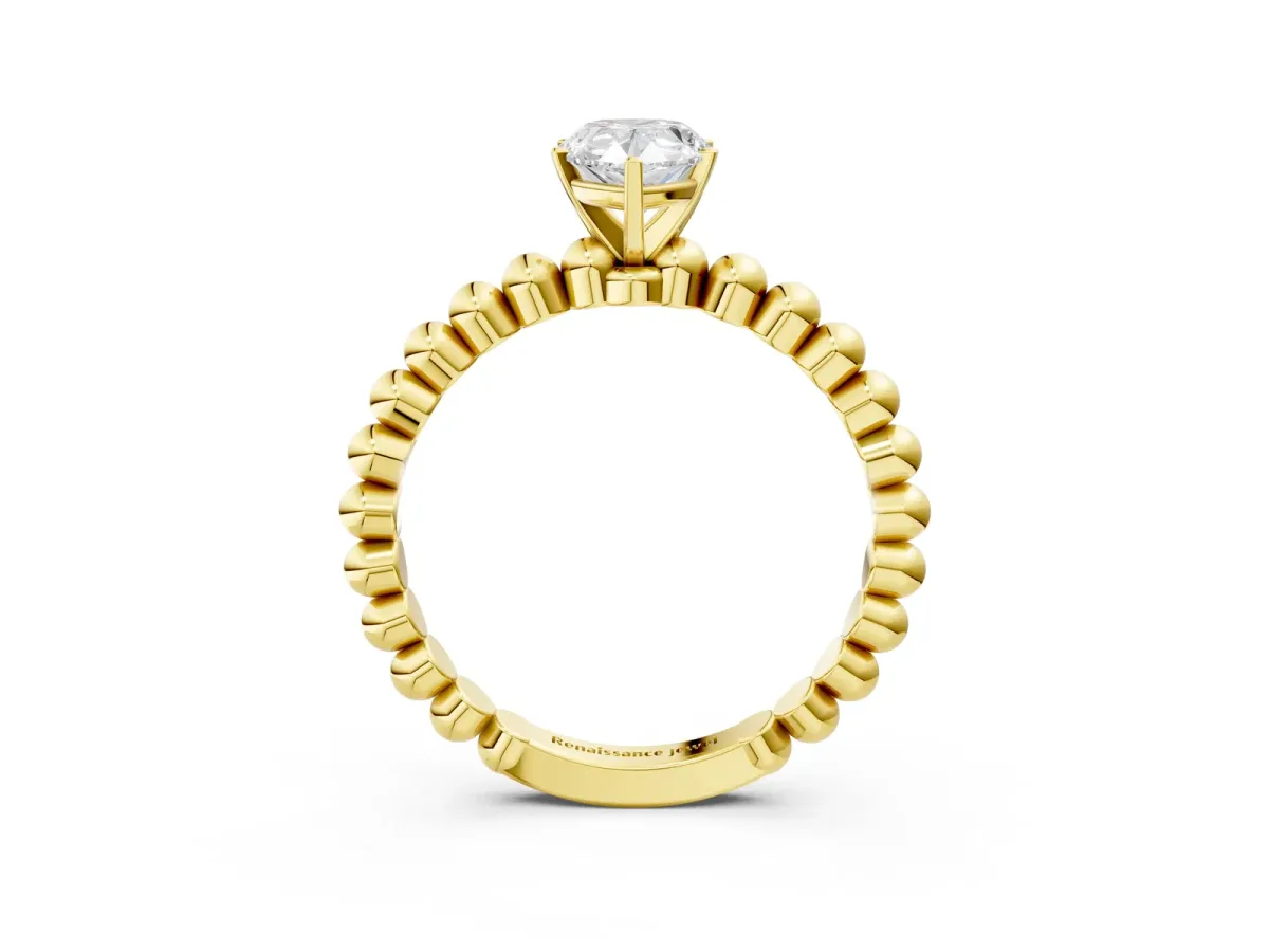 Pear Cut Diamond Solitaire Ring with Beaded Band and Prong Setting Yellow gold