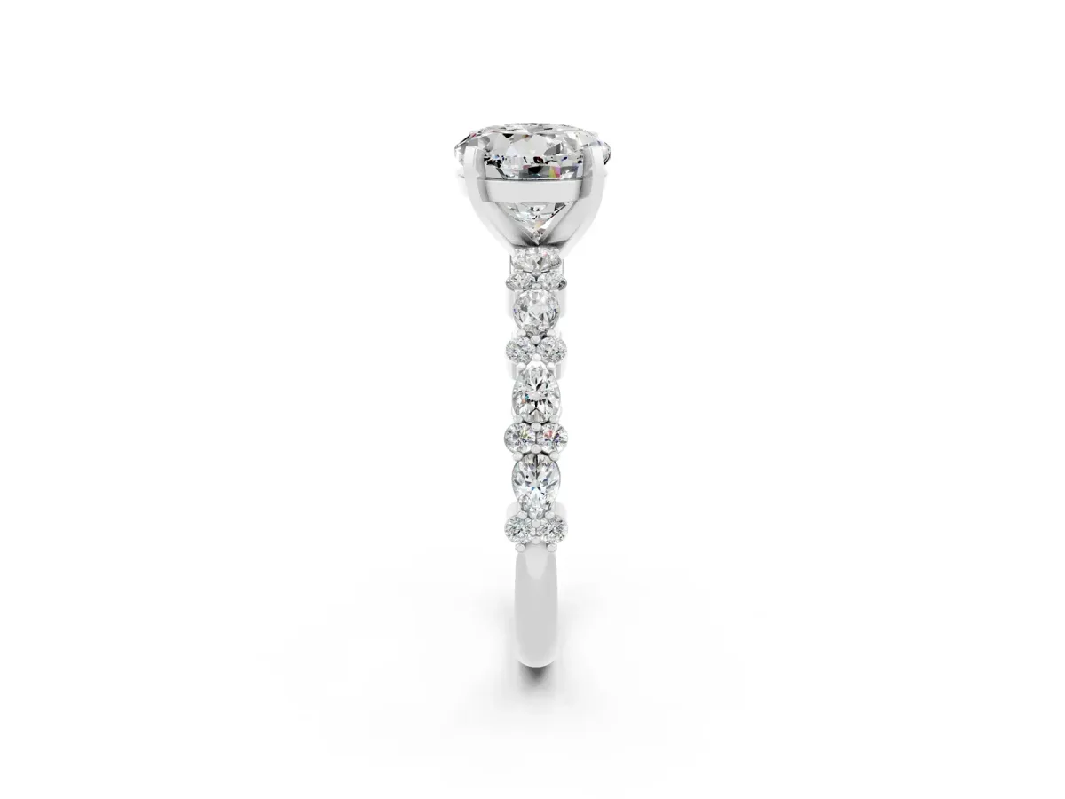 Round Cut Moissanite Side Stone Solitaire Ring with Round and Four-Prong Setting White gold