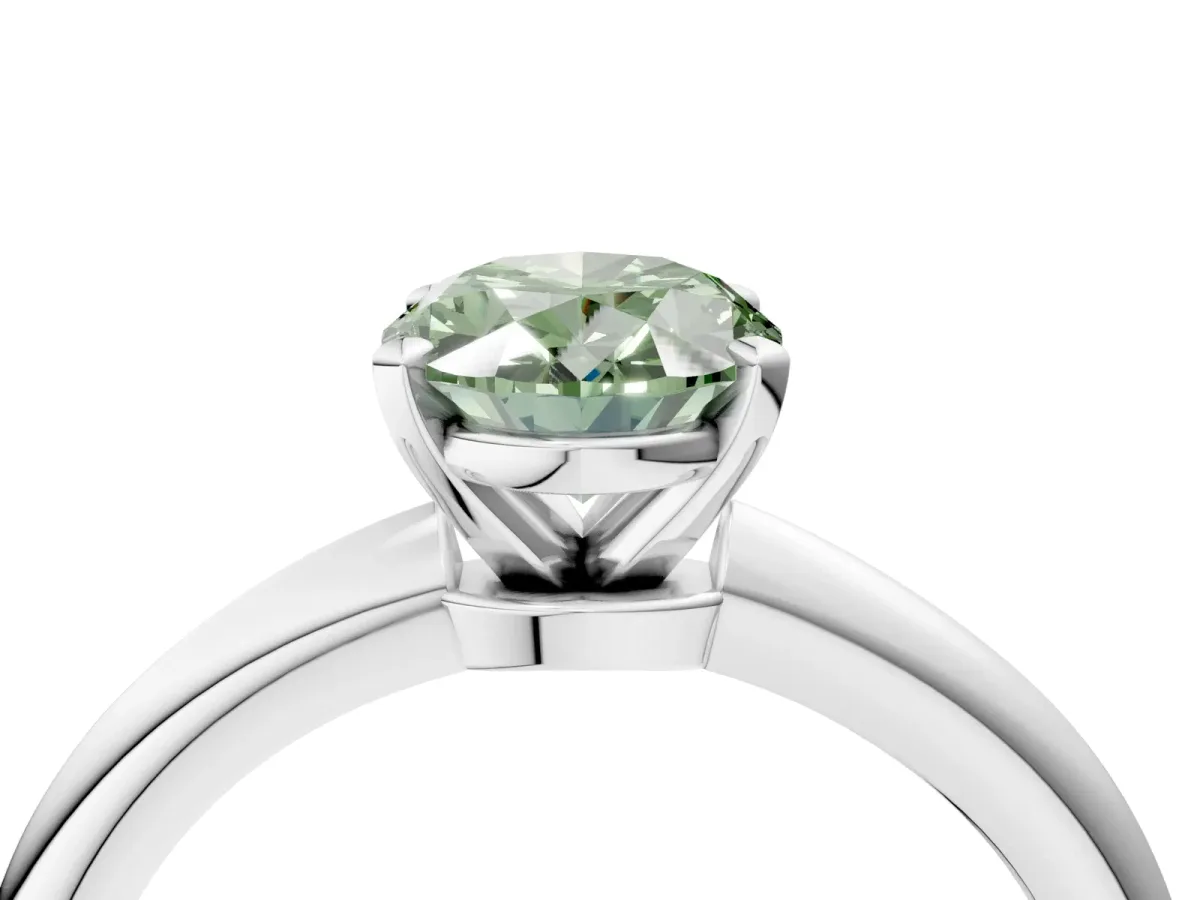 Fancy Green Oval Cut Diamond Solitaire Ring with Six-Prong Setting and Classic Band Silver