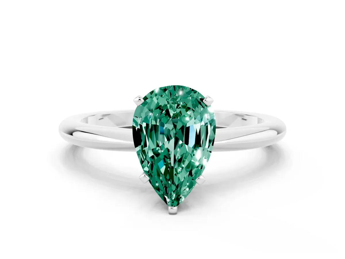 Pear Cut Green Sapphire Solitaire Ring with Six-Prong Setting and Classic Band Silver