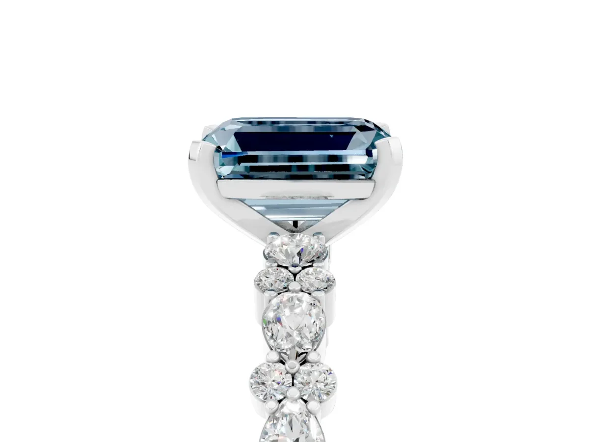 Emerald Cut Aquamarine Side Stone Solitaire Ring with Round and Four-Prong Setting Silver