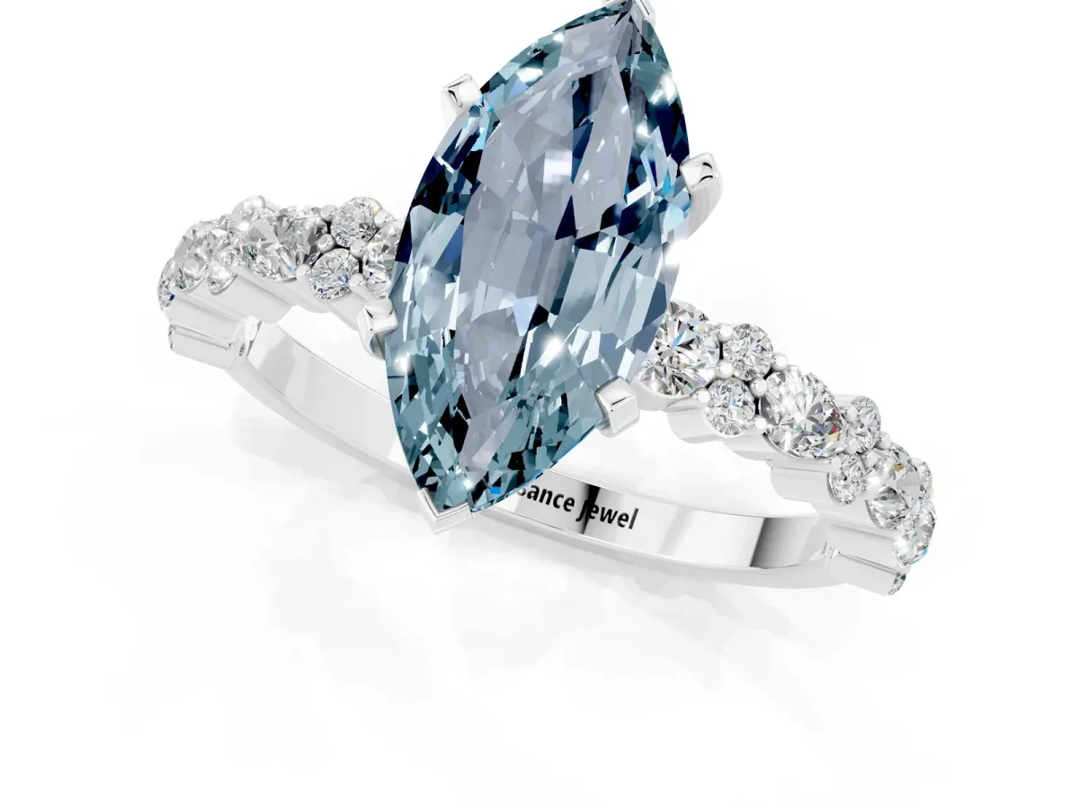 Marquise Cut Aquamarine Side Stone Solitaire Ring with Round and Four-Prong Setting Silver