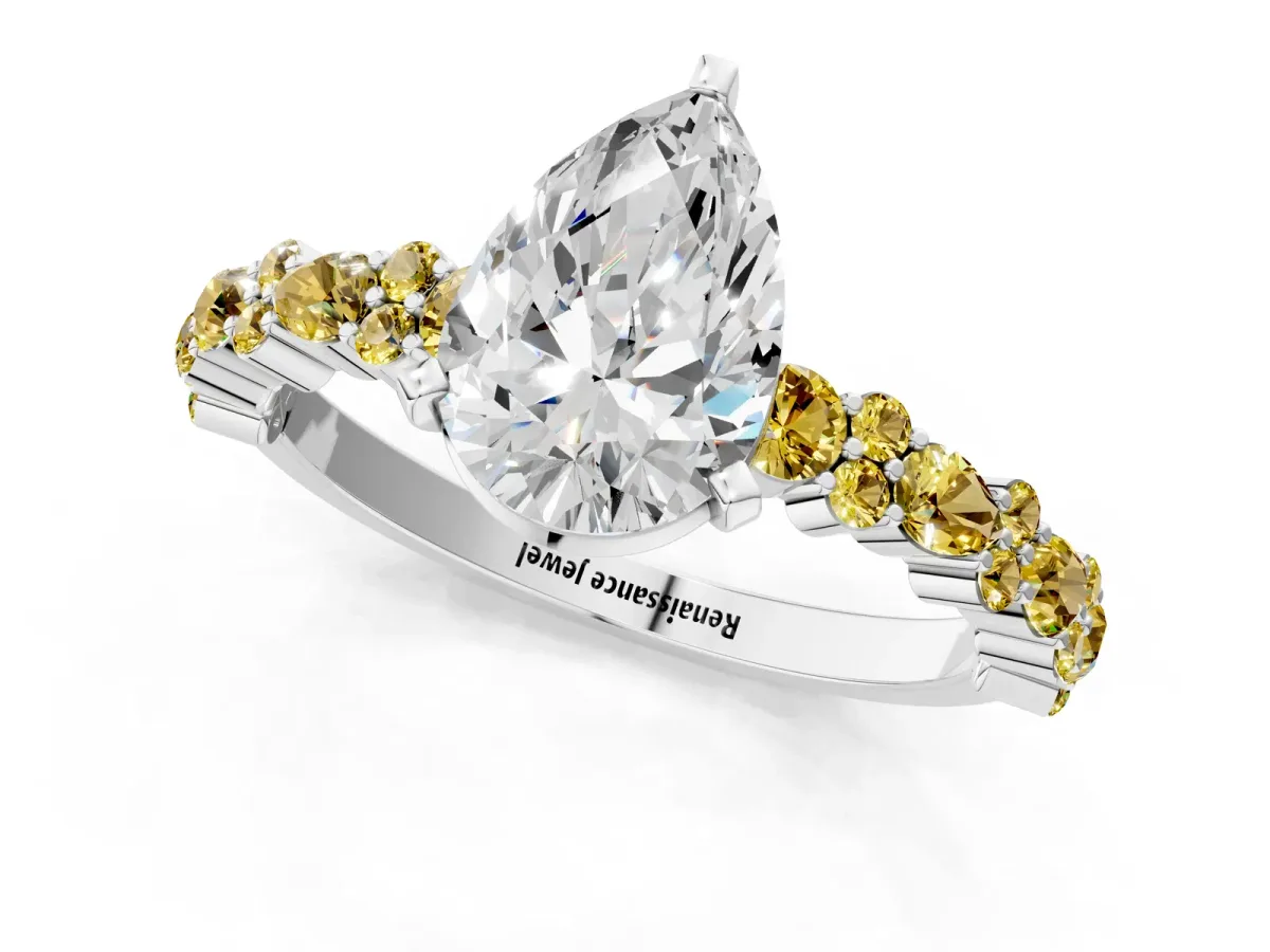 Pear Cut Diamond Side Stone Solitaire Ring with Round Yellow Sapphire and Four-Prong Setting Silver