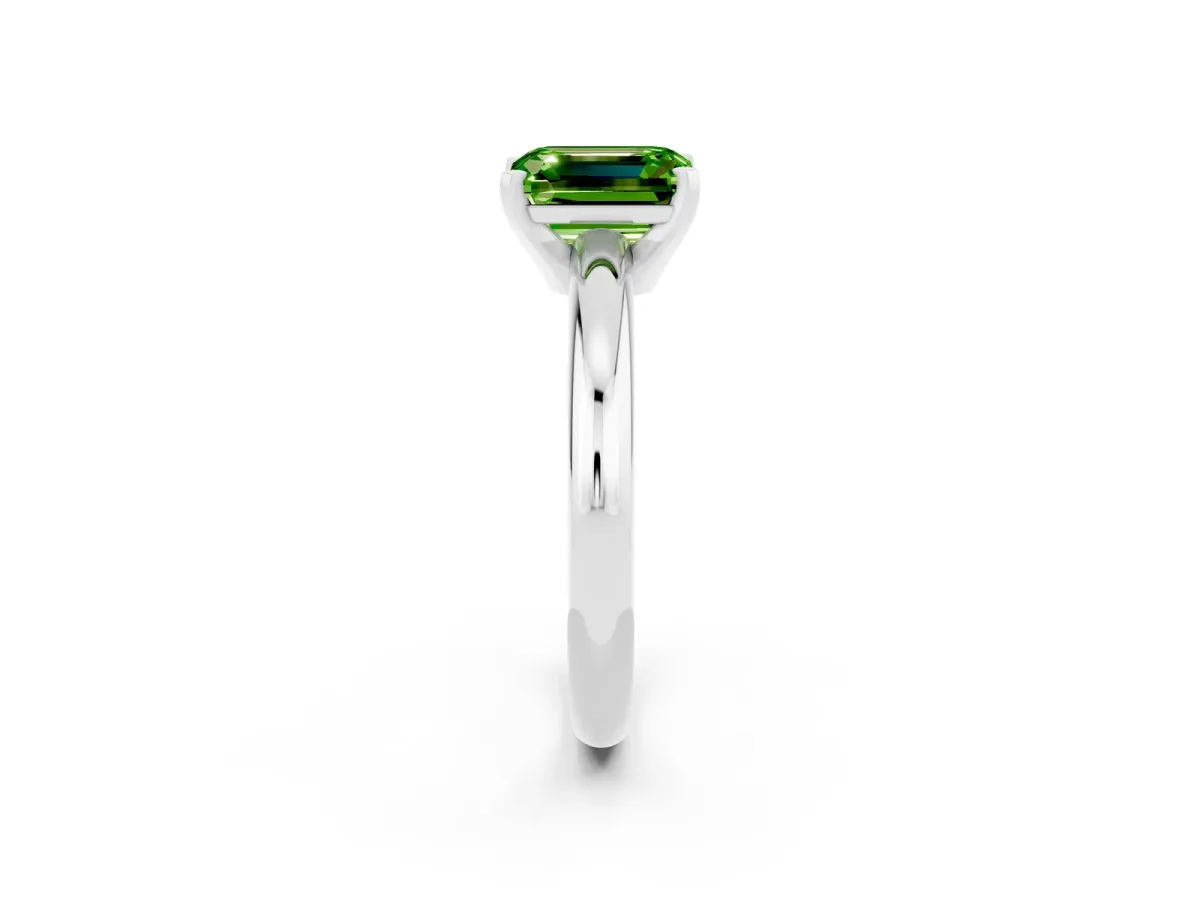 Emerald Cut Peridot Solitaire Engagement Ring with Round Band and Four-Prong Setting Silver