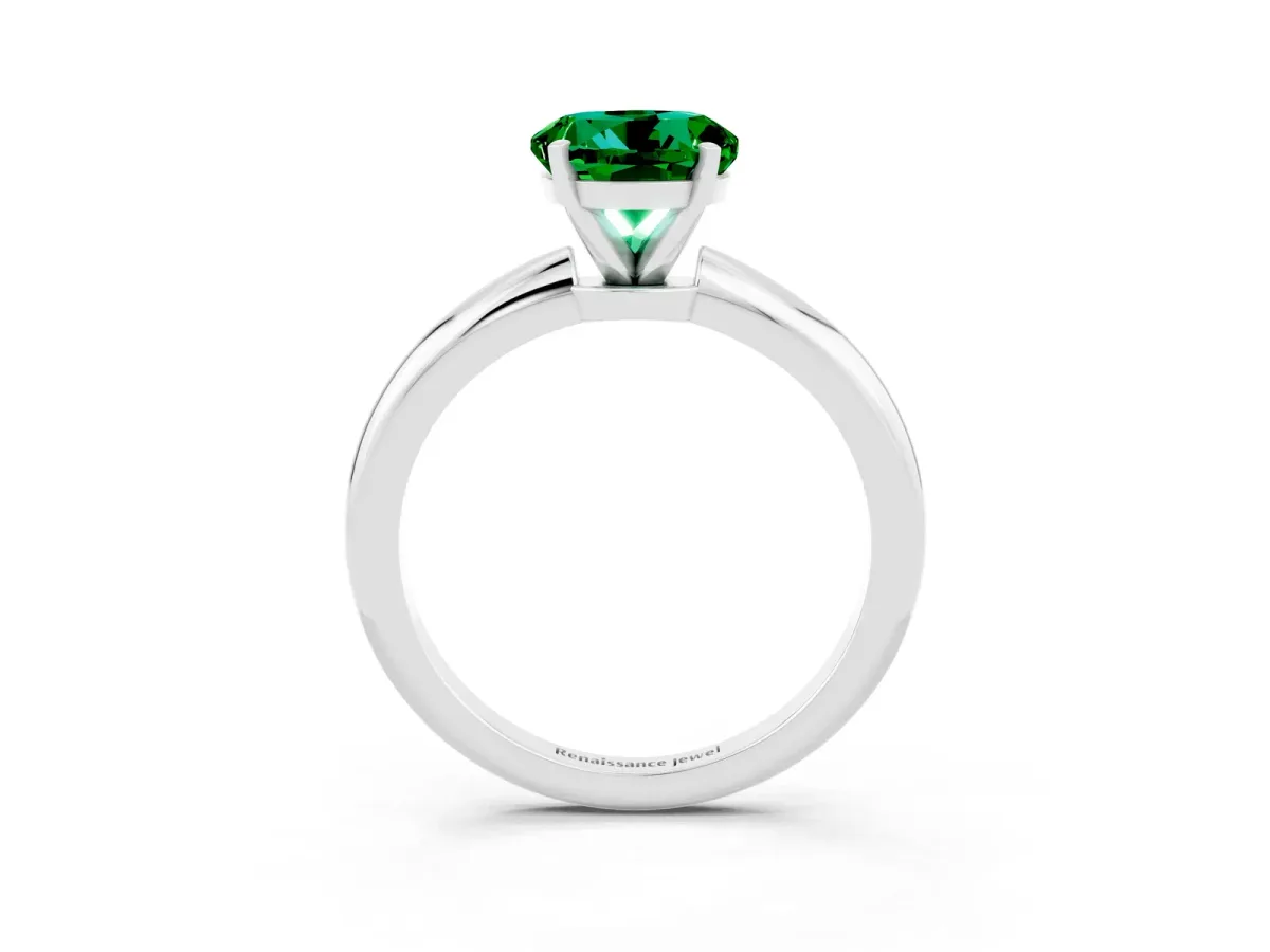 Round Cut Emerald Solitaire Ring with Six-Prong Setting and Classic Band Platinum