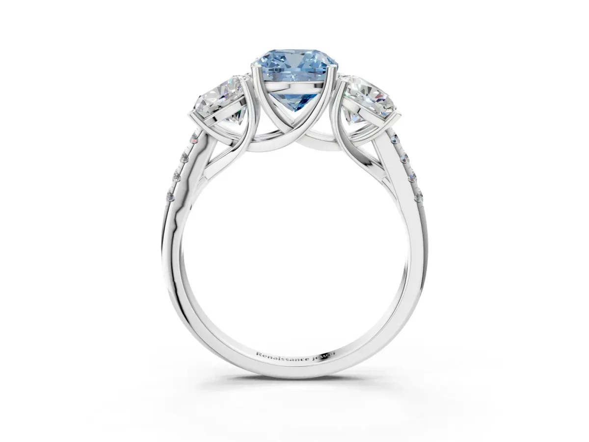 Fancy Blue Three-Stone Cushion Cut Diamond Ring with Round Pavé Band and Prong Setting Silver