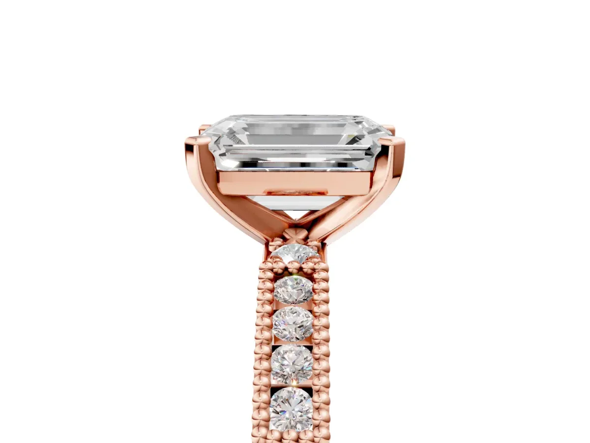 Emerald Cut Solitaire with Pavé Band and Four-Prong Setting Rose gold