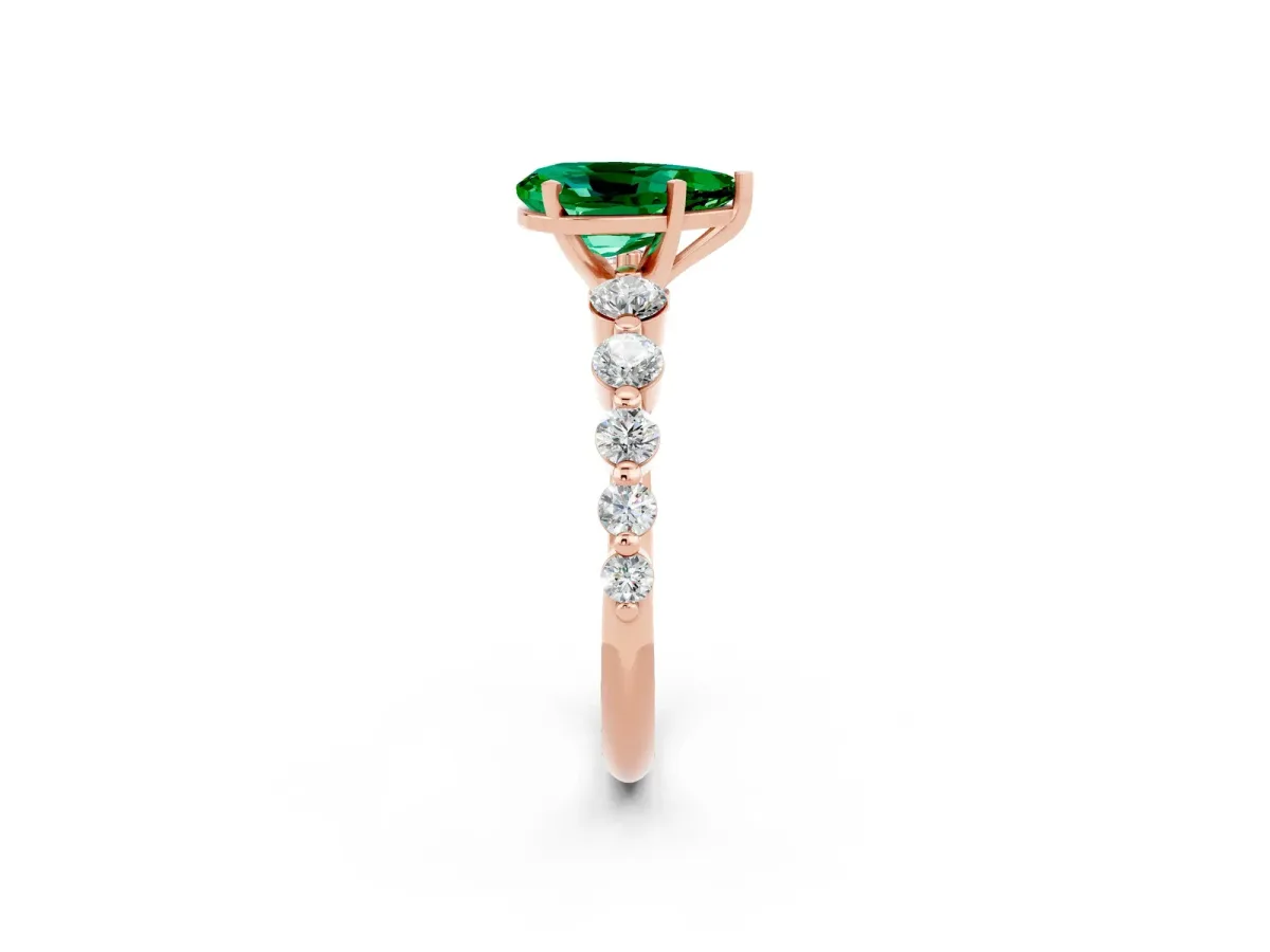 Pear Cut Solitaire Emerald Ring with Pave Band and Four-Prong Setting Rose gold