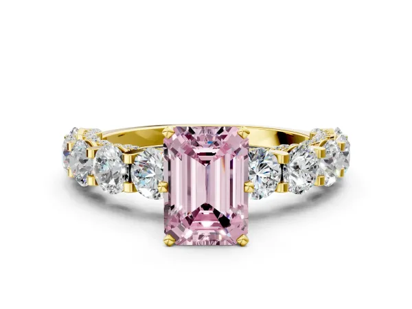 Fancy Pink Emerald Cut Diamond Side Stone Engagement Ring with Four-Prong Setting Yellow gold