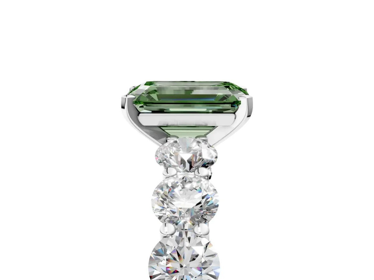 Fancy Green Emerald Cut Diamond Prong Setting with Side Stones on a Pave Band Silver