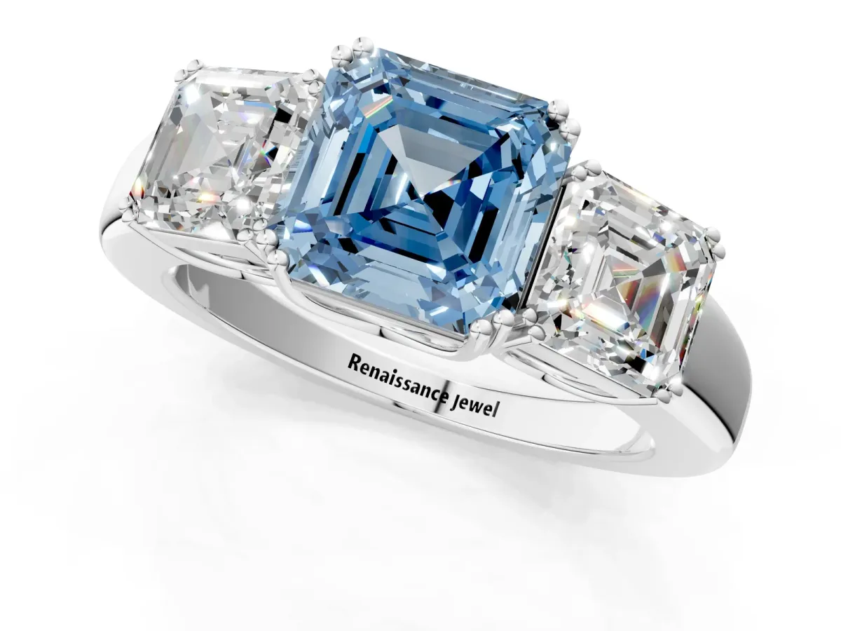 Fancy Blue Three-Stone Asscher Cut Cut Diamond Ring with Channel Set Band and Four-Prong Setting Silver