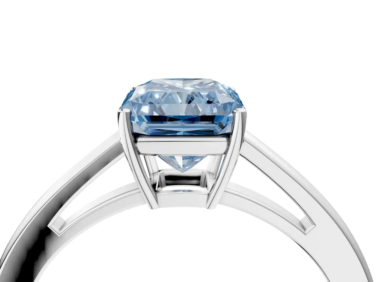 Fancy Blue Radiant Cut Solitaire Diamond Ring with Split Shank and Four-Prong Setting Platinum