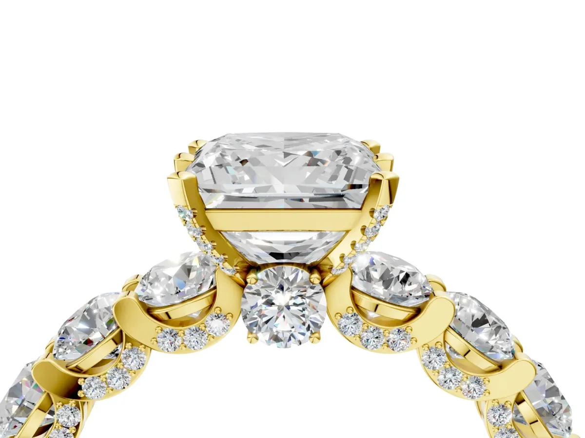 Princess Cut Diamond Side Stone Engagement Ring with Four-Prong Setting Yellow gold