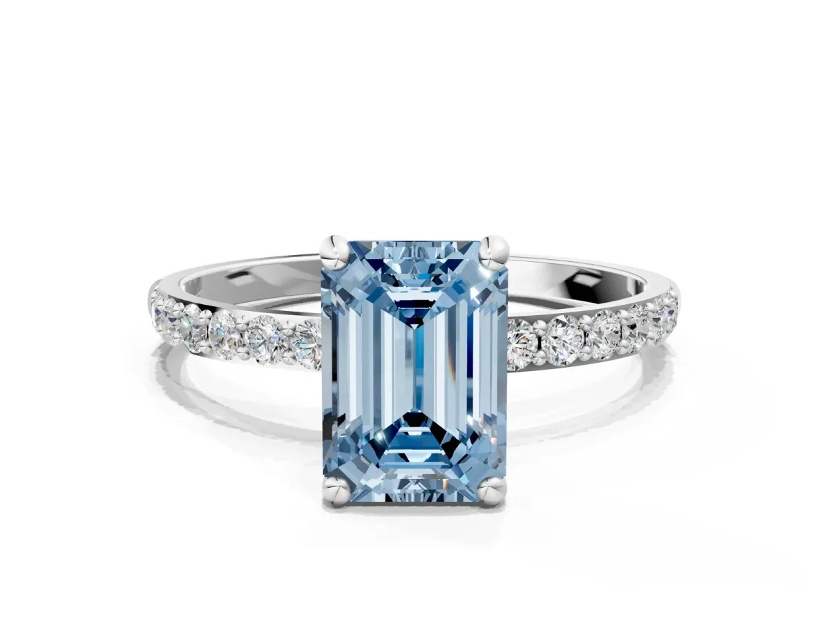 Fancy Blue Emerald Cut Diamond Solitaire Ring with Round Pavé Band and Prong Setting Silver