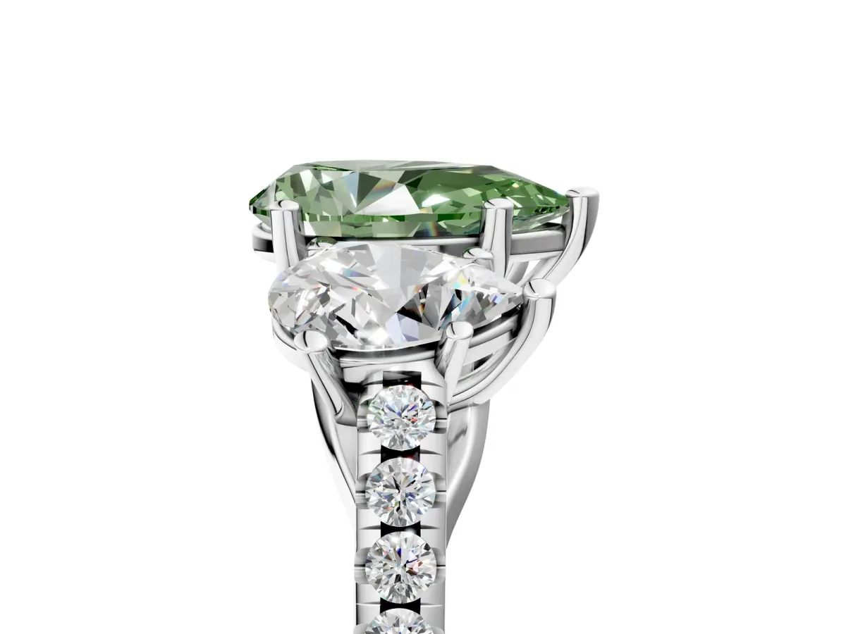 Fancy Green Three-Stone Pear Cut Diamond Ring with Round Pavé Band and Prong Setting Silver
