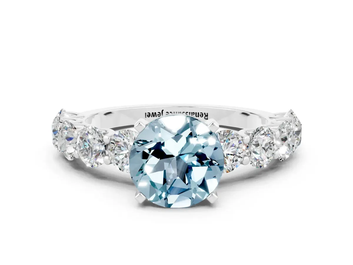 Round Cut Aquamarine Prong Setting with Side Stones on a Pave Band Silver