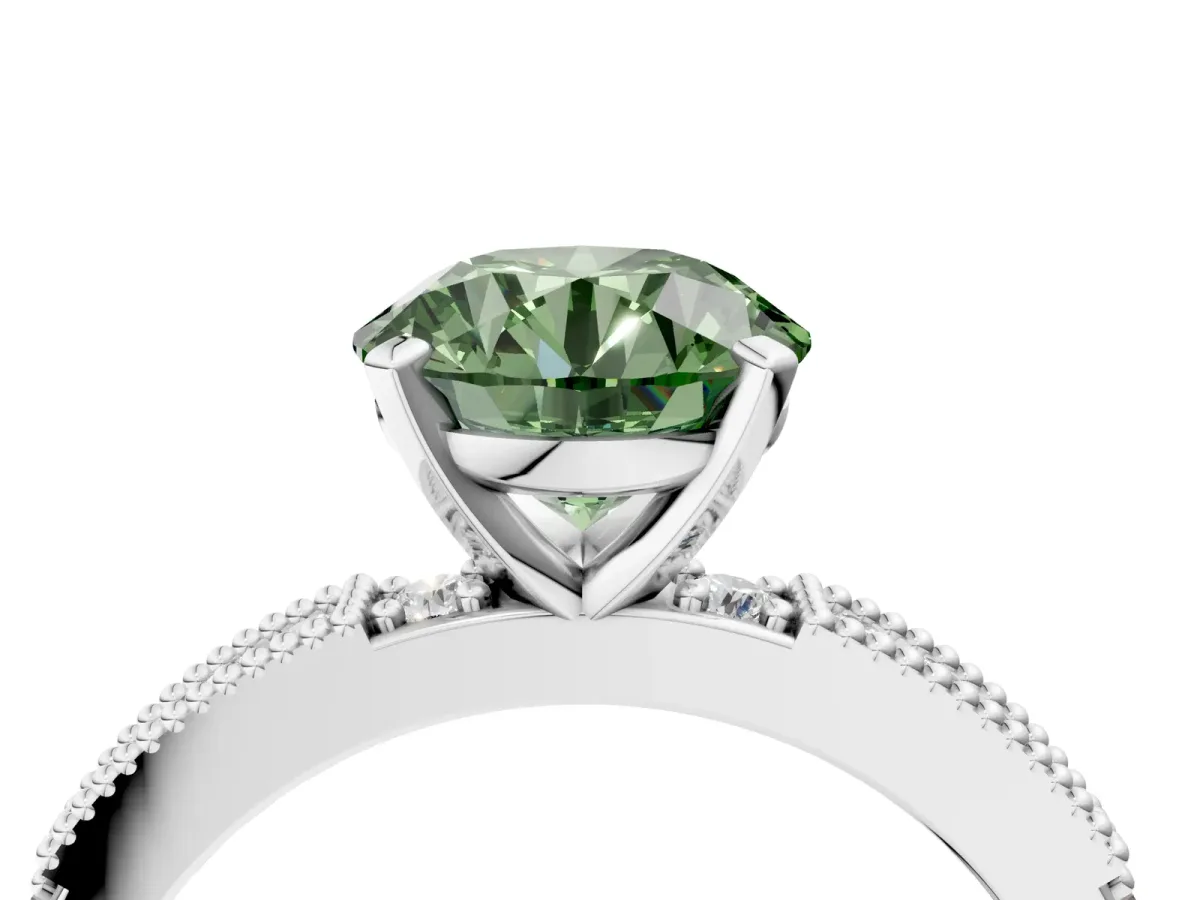 Fancy Green Round Cut Solitaire with Pavé Band and Four-Prong Setting Silver