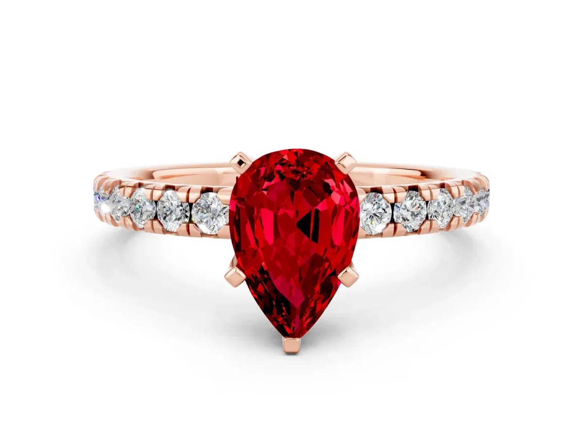 Pear Cut Ruby Solitaire Pavé Engagement Ring with Round Band and Prong Setting Rose gold