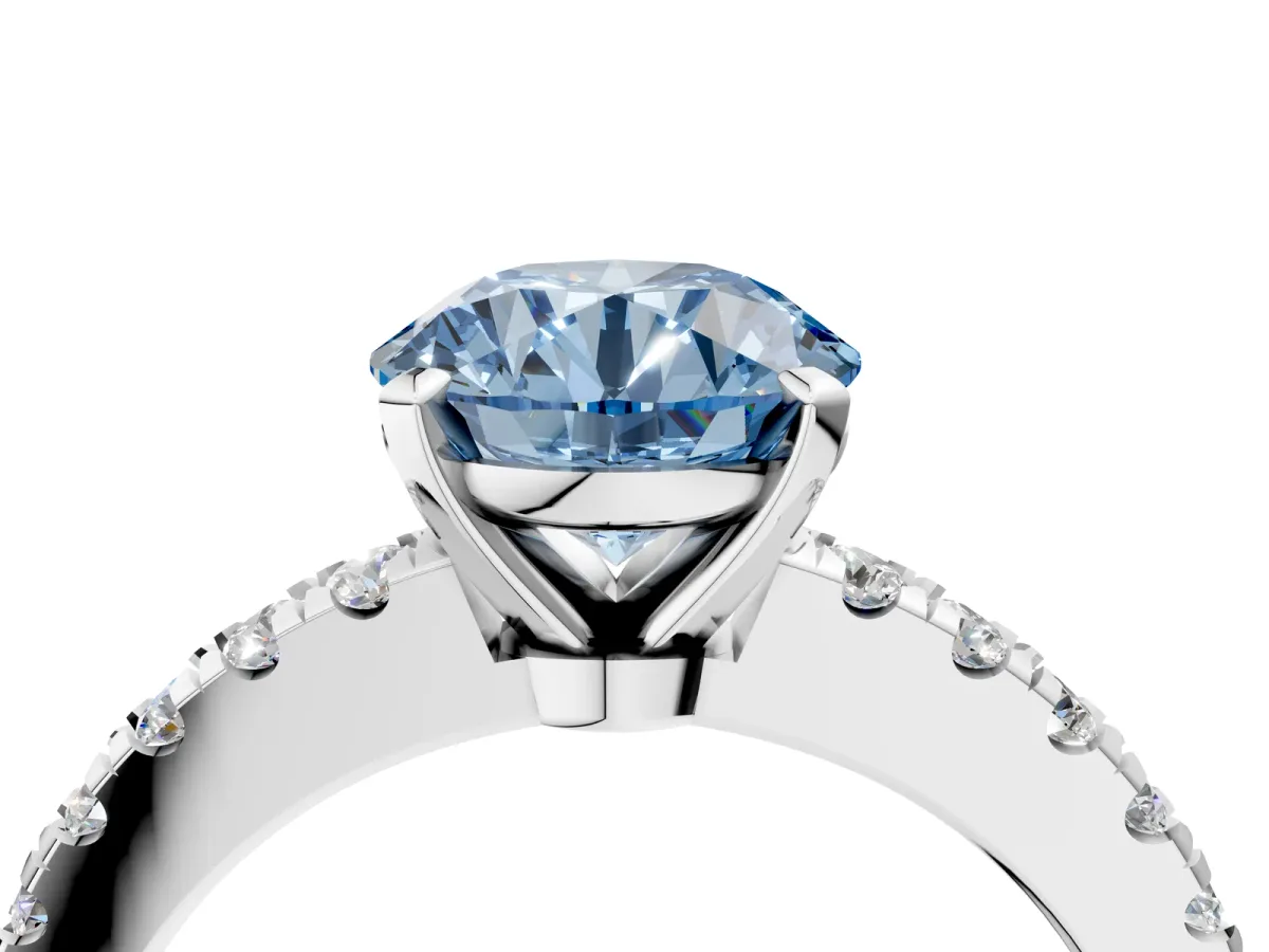 Fancy Blue Round Cut Solitaire Diamond with Pavé Band and Four-Prong Setting Silver