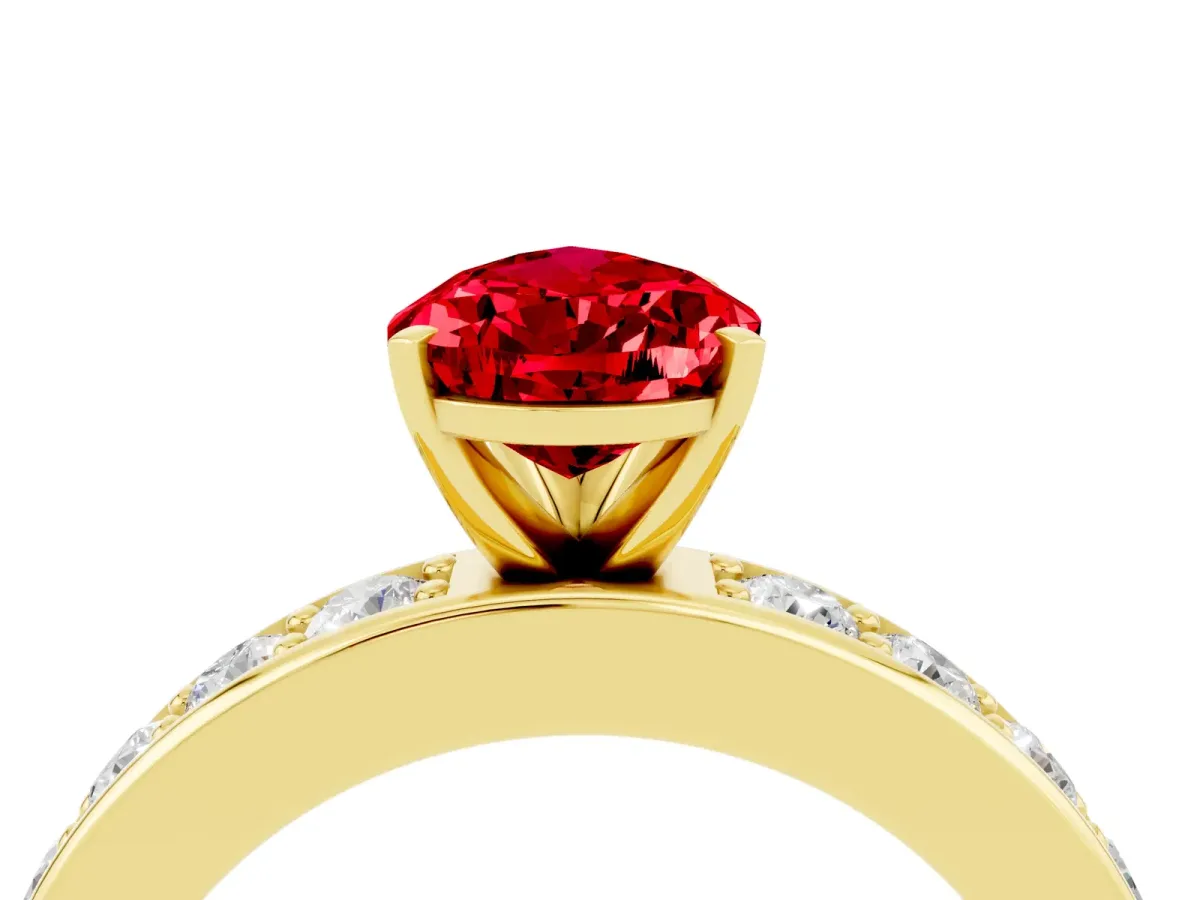 Pear Cut Ruby Engagement Ring with Channel Set Round Band and Prong Setting Yellow gold