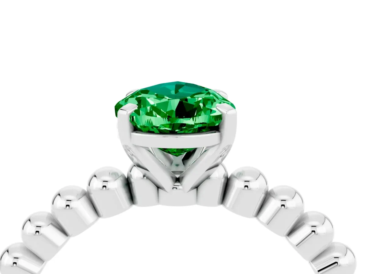 Pear Cut Emerald Solitaire Ring with Beaded Band and Prong Setting White gold