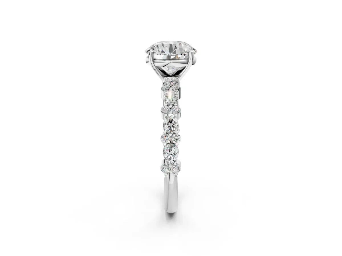 Round Cut Diamond Side Stone Solitaire Ring with Round and Four-Prong Setting White gold