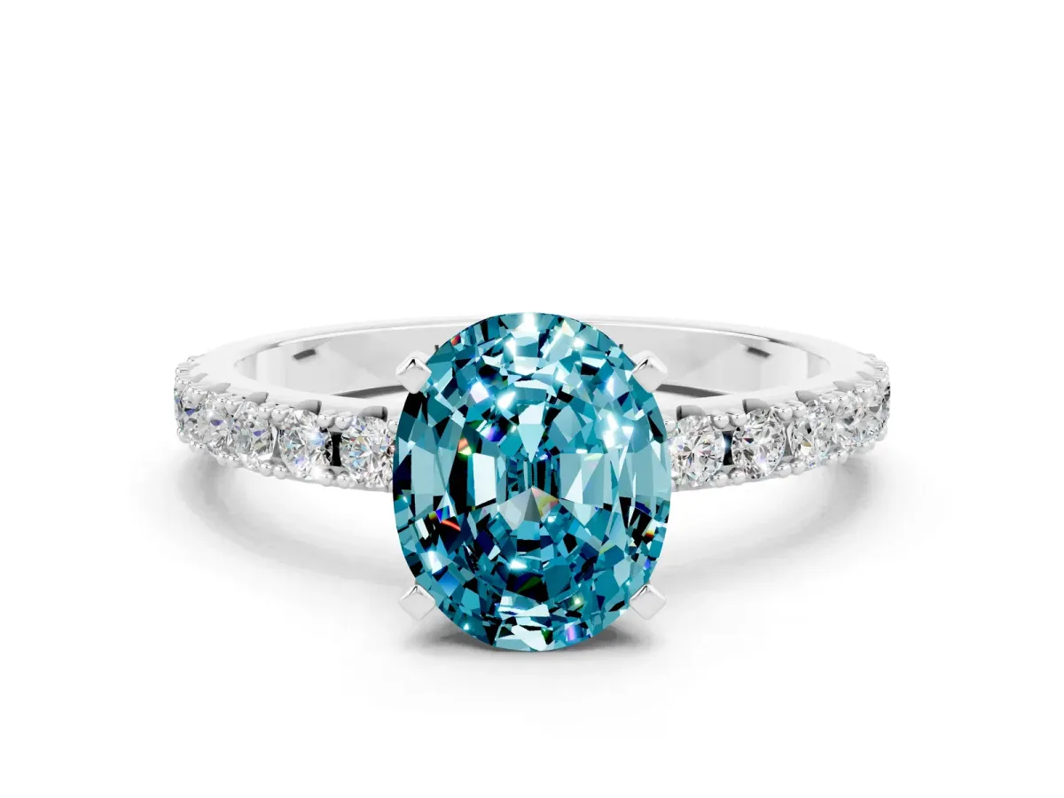 Oval Cut Blue Topaz Solitaire Pavé Band with Four-Prong Setting Silver