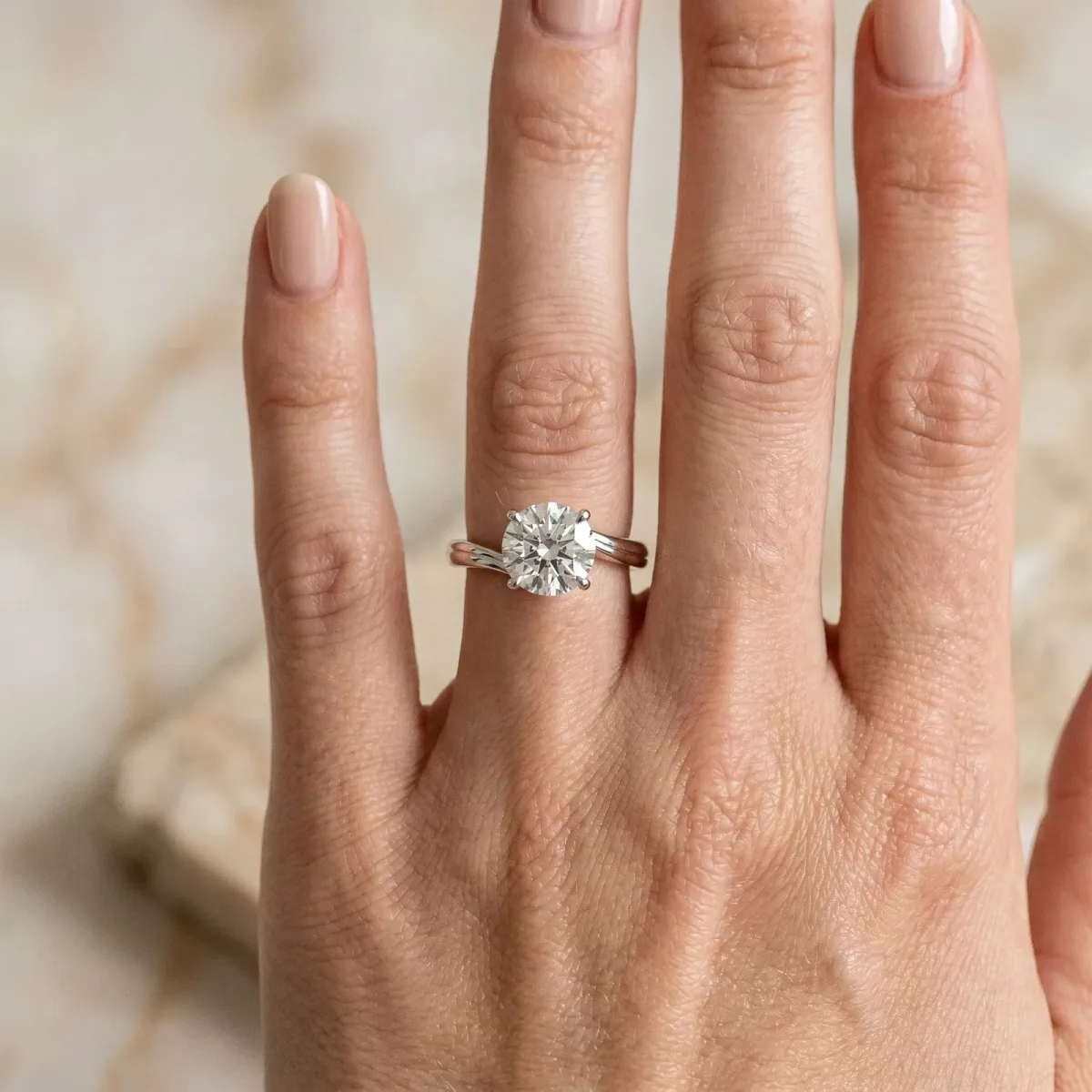 Round Cut Solitaire Twist Band Engagement Ring with Four-Prong Setting Silver