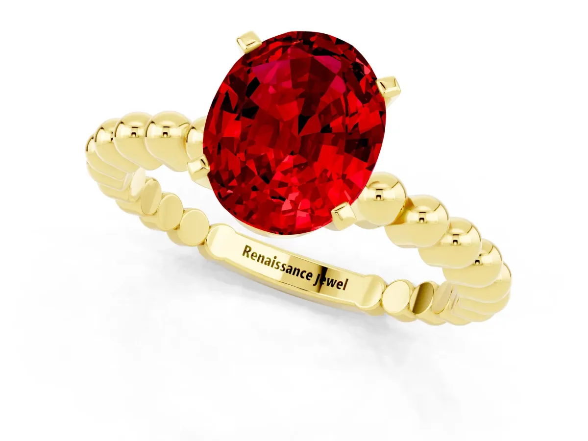 Oval Cut Ruby Solitaire Ring with Beaded Band and Prong Setting Yellow gold
