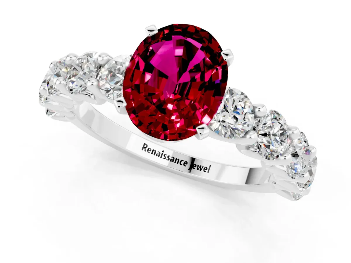 Oval Cut Garnet Prong Setting with Side Stones on a Pave Band Silver