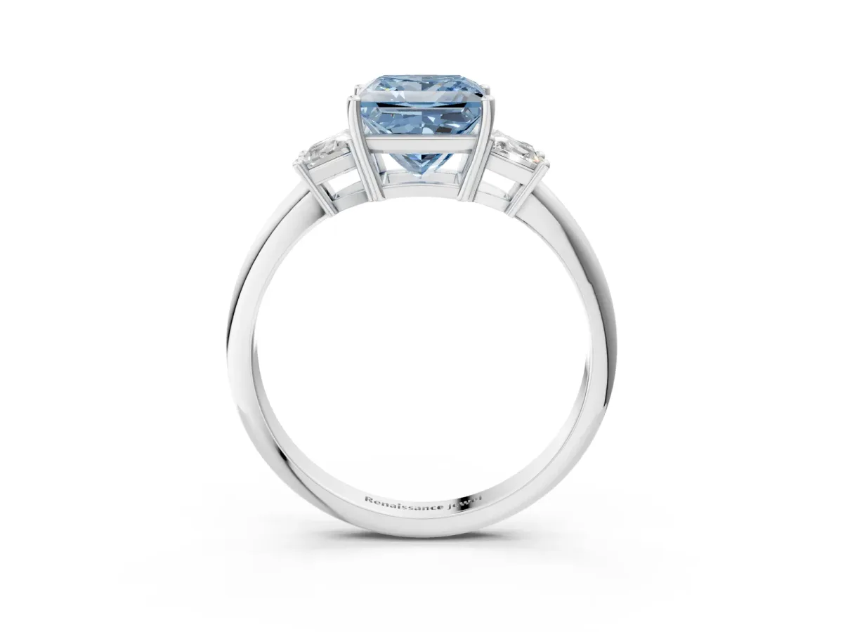 Fancy Blue Princess Cut Diamond Three-Stone Ring with Trapezoid Side Stones and Prong Setting Platinum