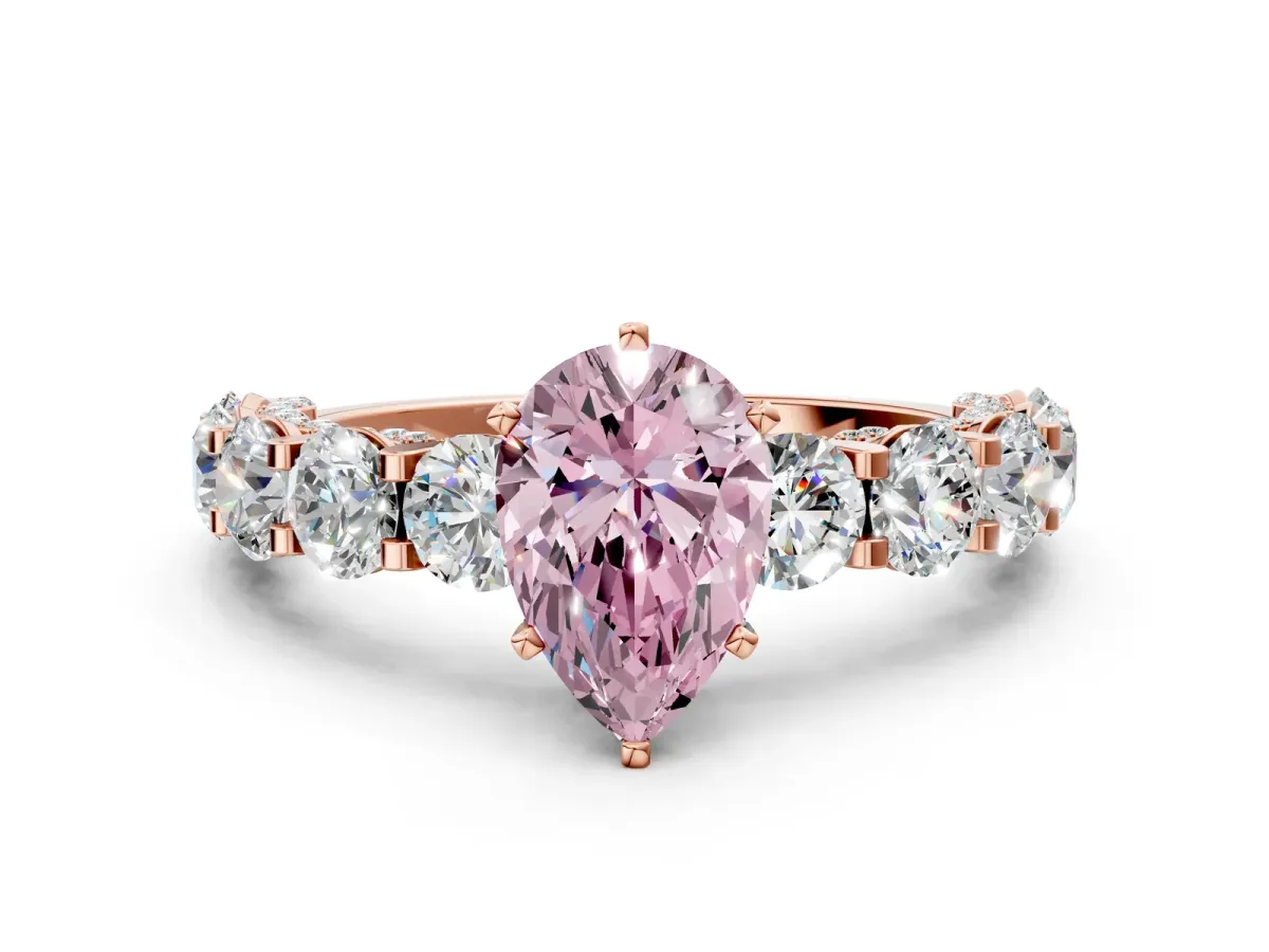 Fancy Pink Pear Cut Diamond Side Stone Engagement Ring with Four-Prong Setting Rose gold