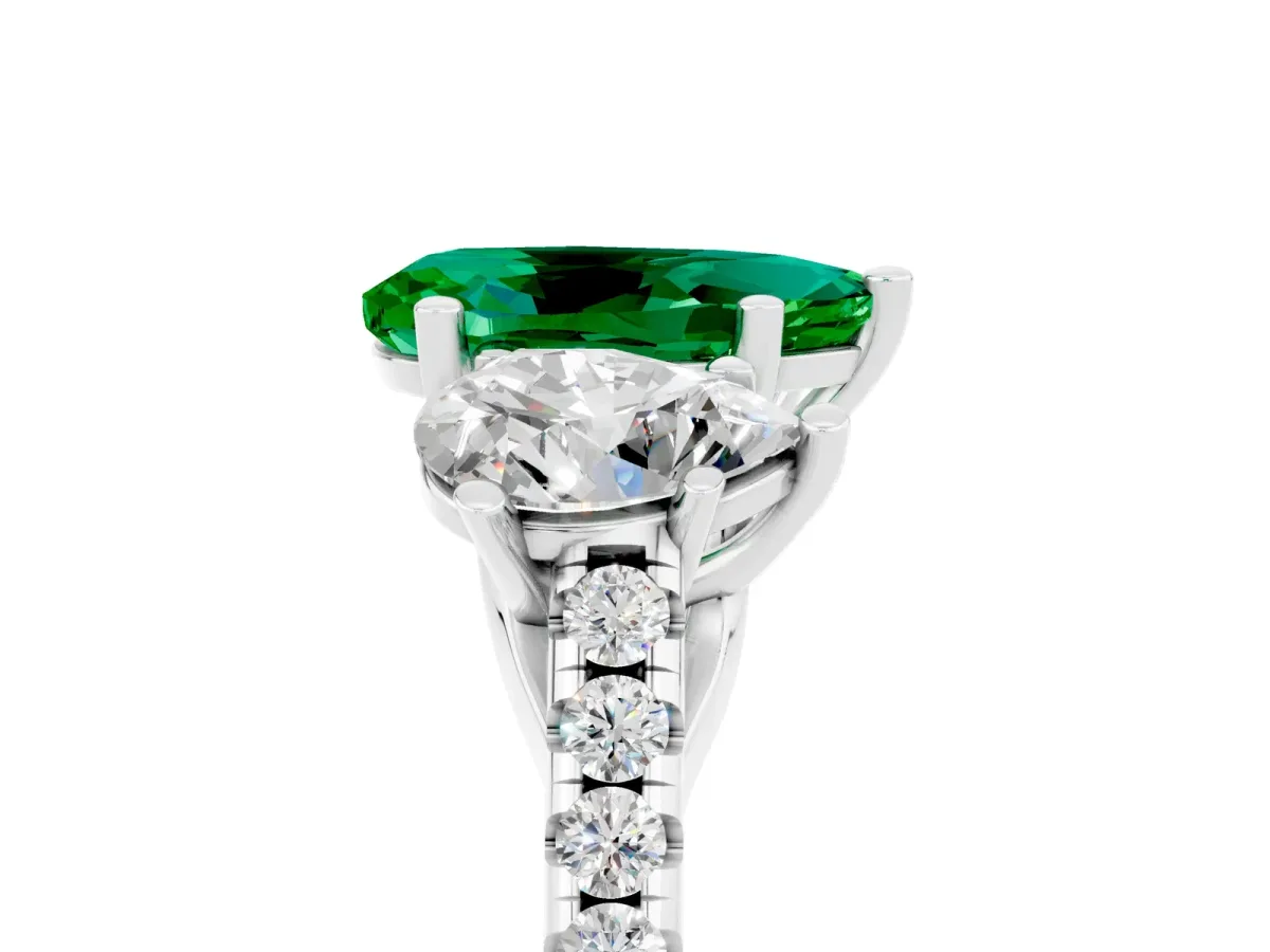 Three-Stone Pear Cut Emerald Ring with Round Pavé Band and Prong Setting Platinum