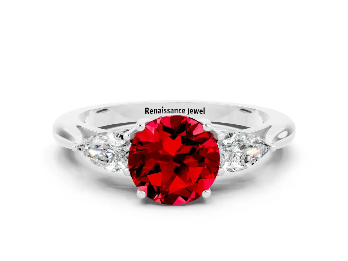 Three-Stone Round Cut Ruby Ring with Pear Side Stones in Four-Prong Setting Platinum