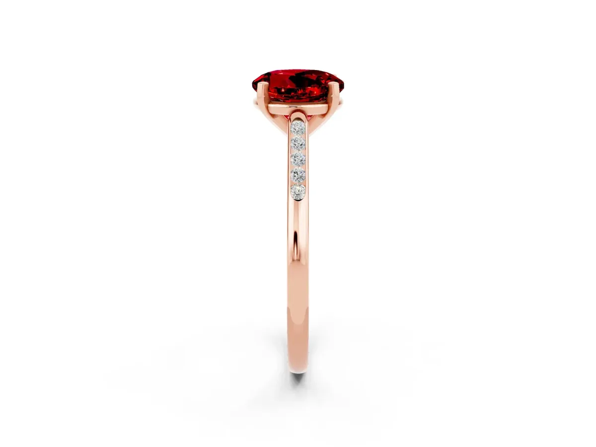 Round Cut Ruby Solitaire Ring with Channel Set Round Band and Prong Setting Rose gold