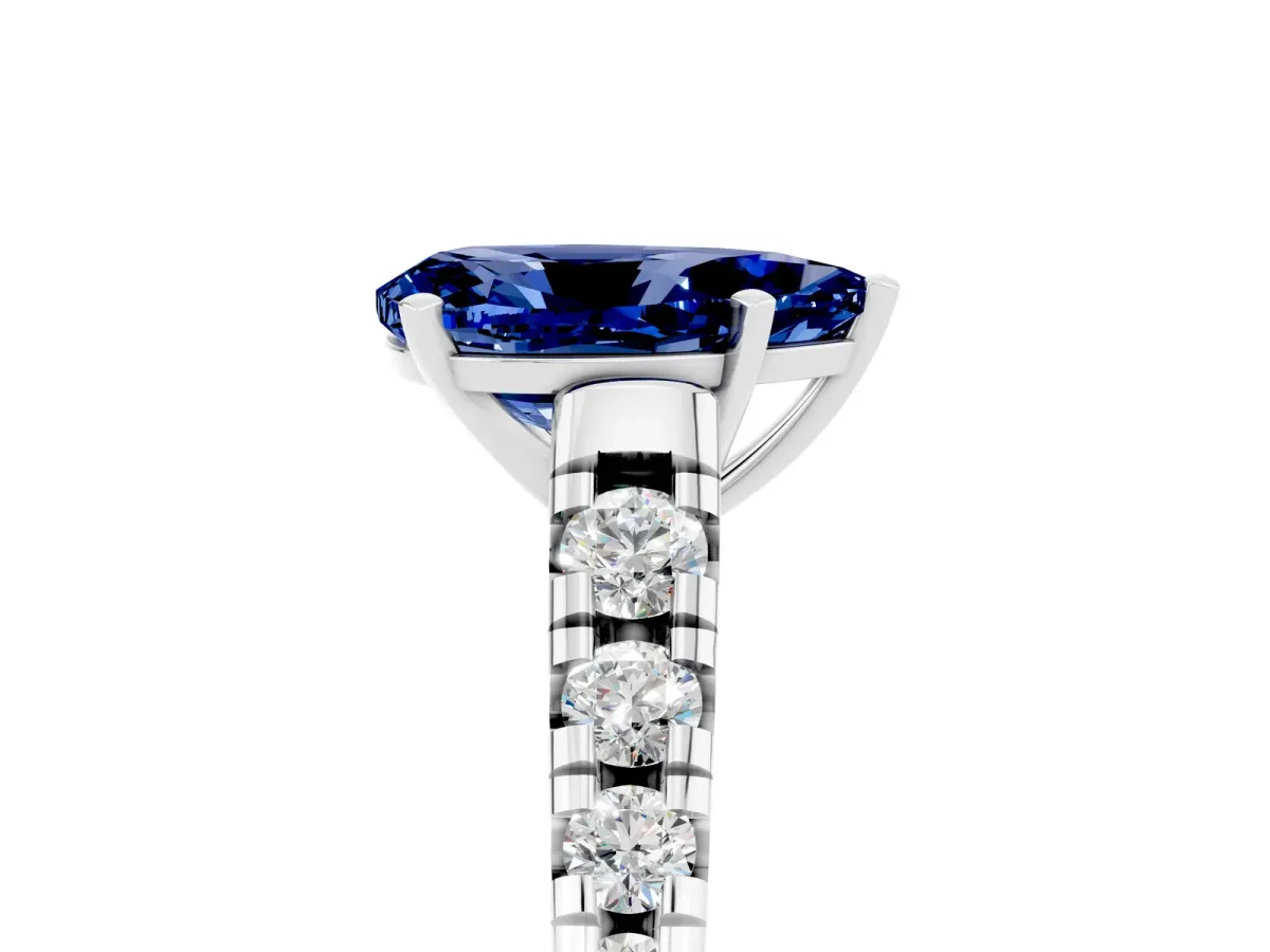 Pear Cut Blue Sapphire Cathedral Solitaire Ring with Round Pavé Band Silver