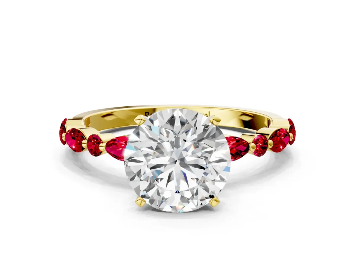Round Cut Diamond Ring with Marquise and Round Ruby Side Stones and Four-Prong Setting Yellow gold