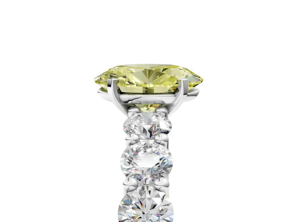 Fancy Yellow Oval Cut Diamond Prong Setting with Side Stones on a Pave Band Platinum
