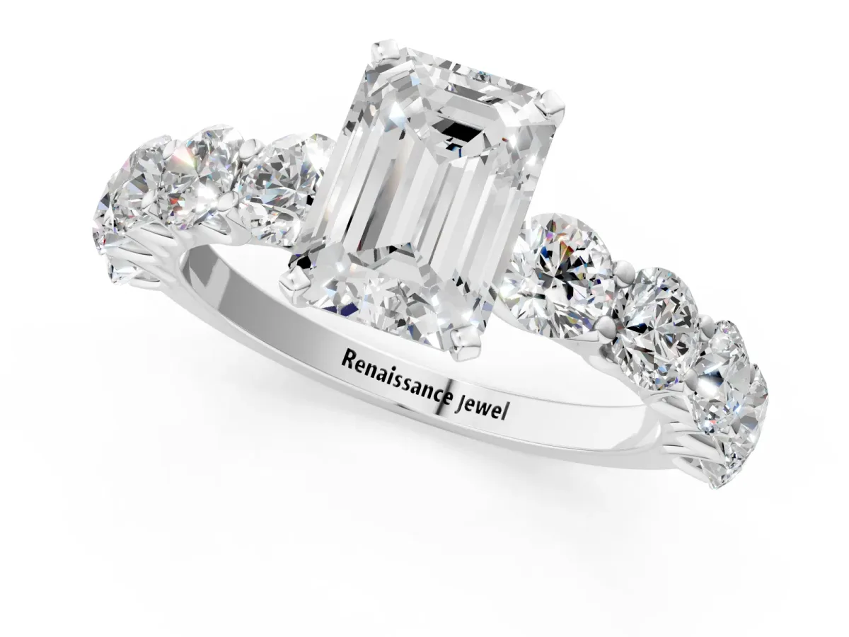 Emerald Cut Diamond Prong Setting with Side Stones on a Pave Band Silver