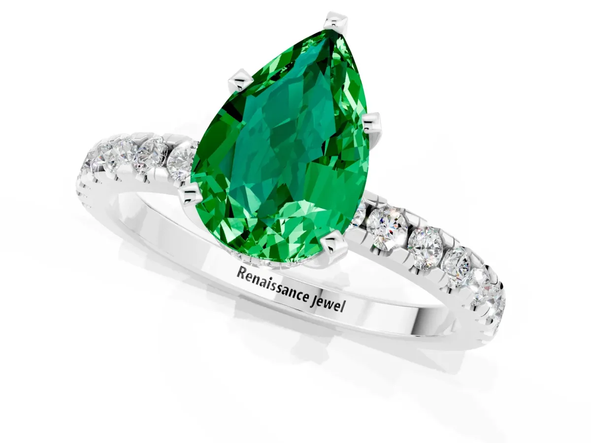 Pear Cut Emerald Solitaire Ring with Round Pavé Band and Four-Prong Setting Silver