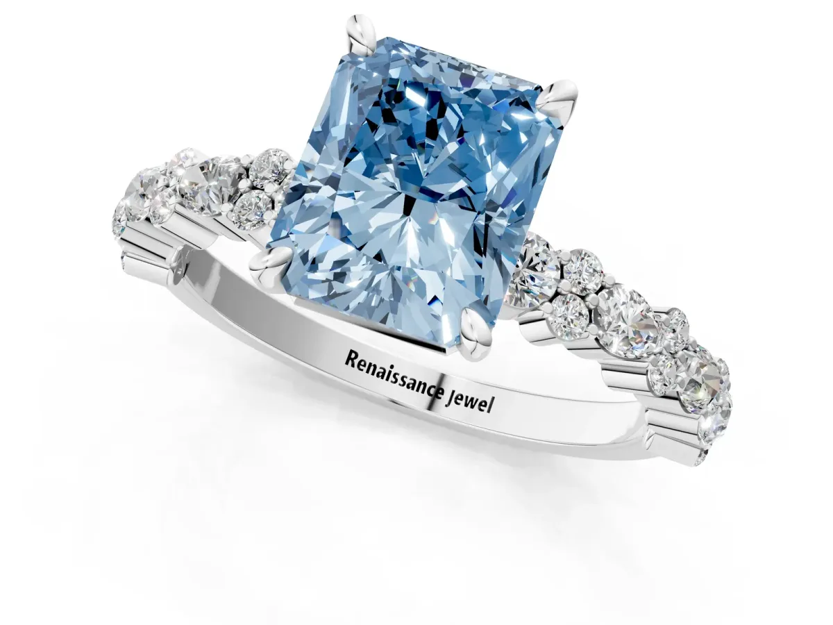 Fancy Blue Radiant Cut Diamond Side Stone Solitaire Ring with Round and Four-Prong Setting Platinum